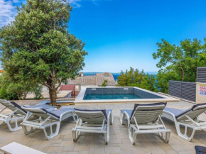 Holiday home with swimming pool and sea view